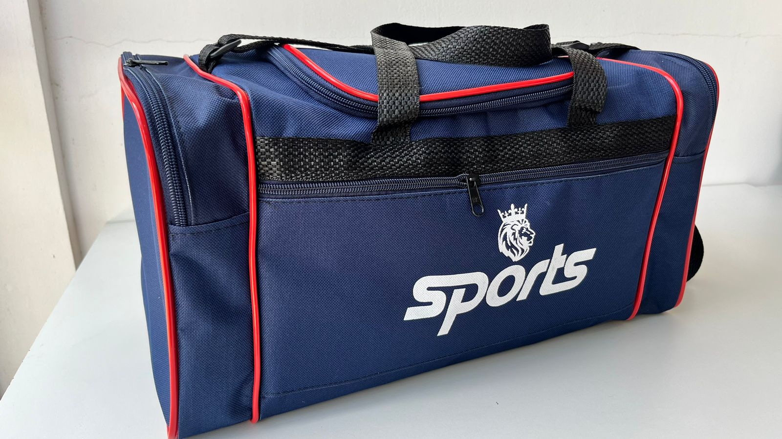 Bolsa de Time 04 azul com detalhes vermelhos